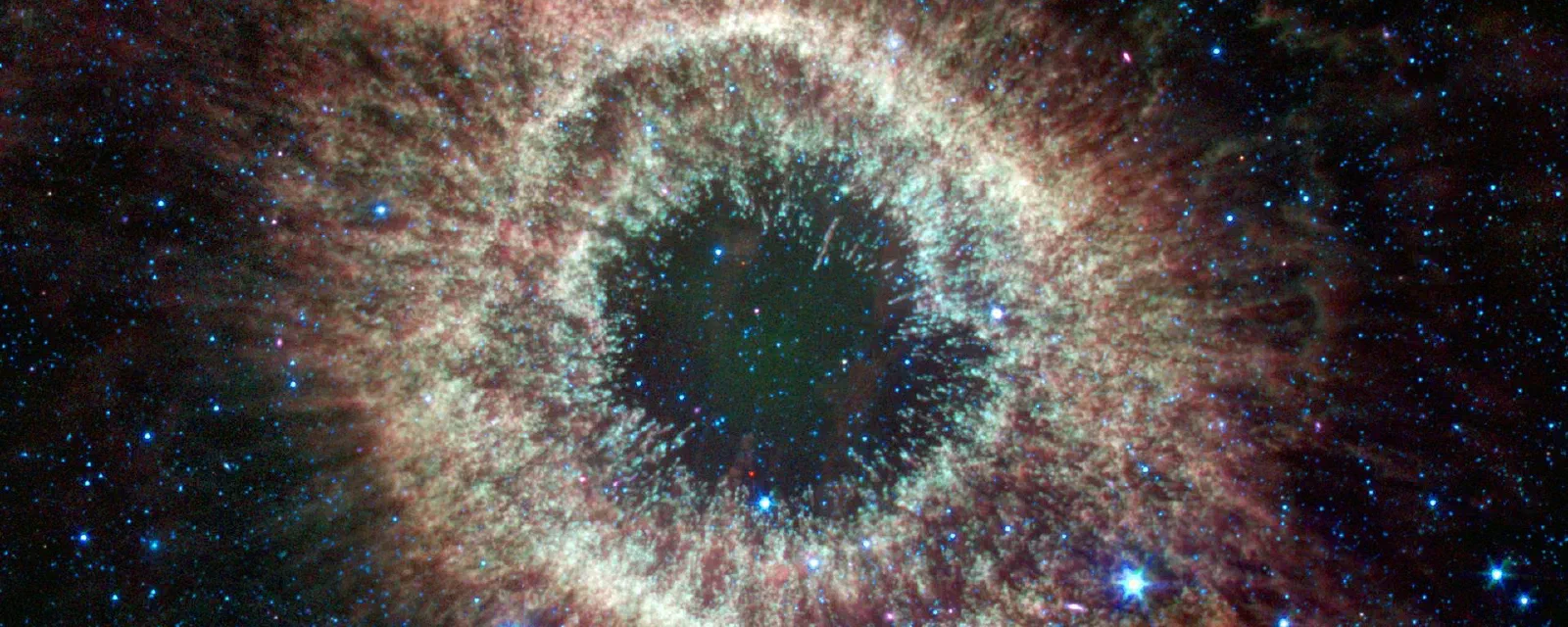 Spitzer Celebrates Fourth Anniversary with Celestial Fireworks