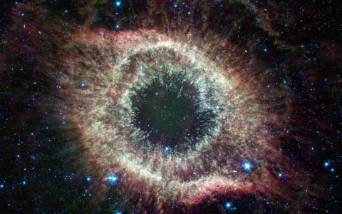 Spitzer Celebrates Fourth Anniversary with Celestial Fireworks